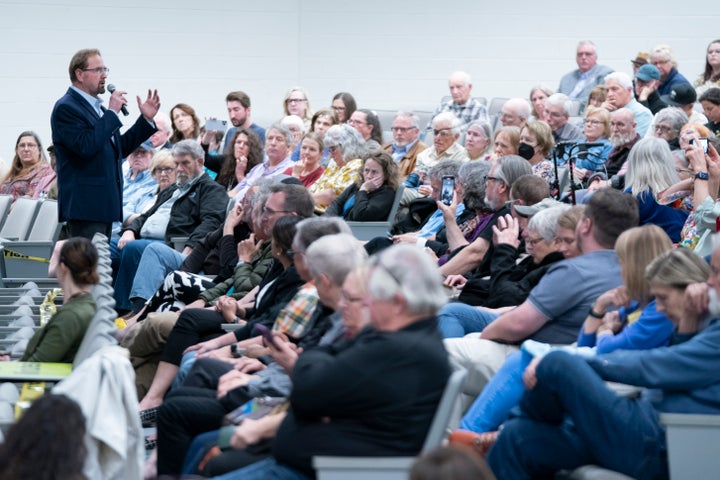 People listen as Rep. Chuck Edwards (R-NC) speaks during a congressional town hall meeting on March 13, 2025 in Asheville, North Carolina. (Photo by Sean Rayford/Getty Images)