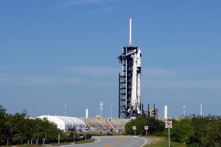 A SpaceX Falcon 9 rocket with the Crew Dragon spacecraft stands ready for a mission to the International Space Station on pad 39A at the Kennedy Space Center in Cape Canaveral, Fla., Friday, March 14, 2025.