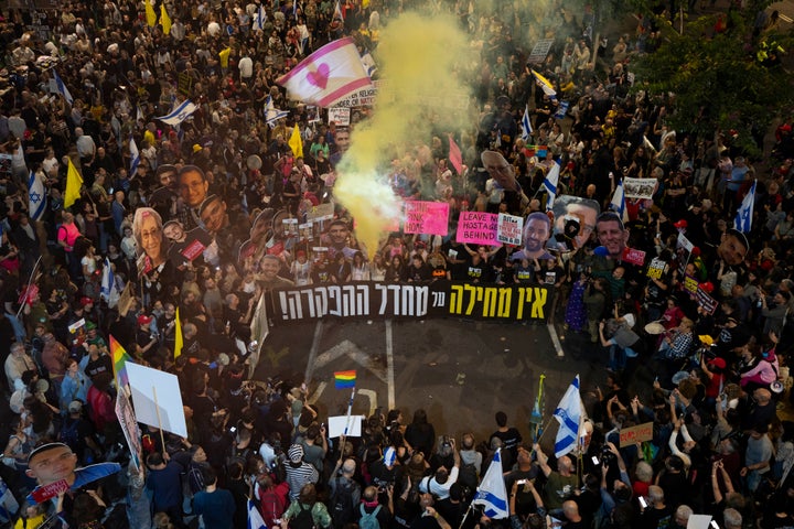 People take part in a protest demanding the immediate release of hostages held by Hamas in the Gaza Strip, in Tel Aviv, Israel, Saturday, March 15, 2025. (AP Photo//Oded Balilty)