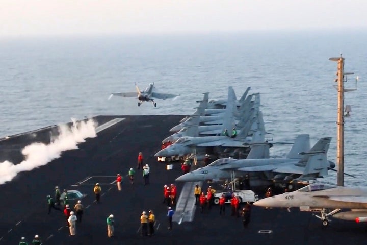 This image taken from video provided by the U.S. Navy shows an aircraft launching from the USS Harry S. Truman in the Red Sea before airstrikes in Sanaa, Yemen, Saturday, March 15, 2025. (U.S. Navy via AP)