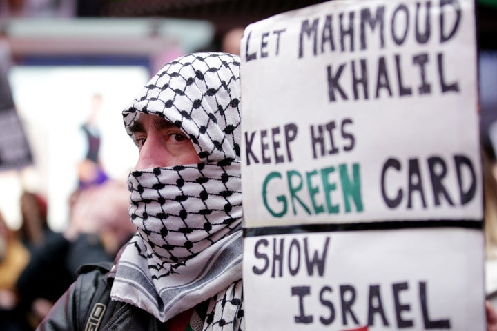 Pro-Palestinian activists participate in a "Fight for our Rights" rally in support of Mahmoud Khalil, in New York's Times Square on Saturday.