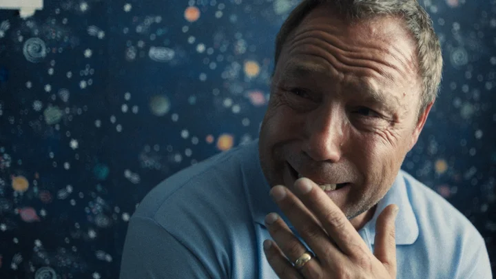 Eddie, Jamie’s dad played by Stephen Graham, in anguish crying in Jamie’s space themed bedroom in the final moments of the series.