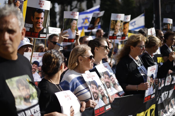 Relatives and supporters of Israeli hostages who have been held captive in Gaza since October 2023 hold their portraits during a protest outside the Israeli parliament (Knesset) in Jerusalem on March 18, 2025. The protesters accused Prime Minister Benjamin Netanyahu of sacrificing their loved ones by violently ending the ceasefire agreement.