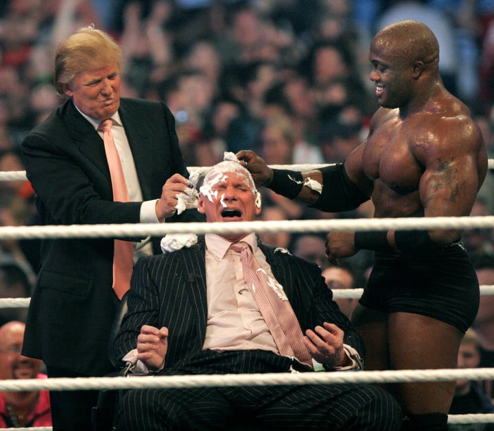 A showman past: WWE chairman Vince McMahon, center, has his head shaved by Donald Trump and Bobby Lashley (right) after losing a bet in the Battle of the Billionaires at the 2007 World Wrestling Entertainment's Wrestlemania.