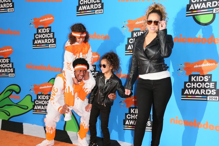 Mariah Carey and Nick Cannon arrive with their children at the 31st Annual Nickelodeon Kids' Choice Awards on March 24, 2018, in Inglewood, California. 