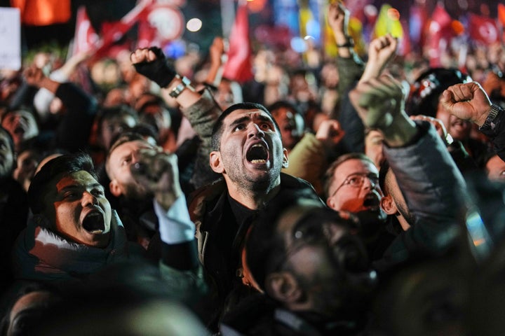 People gather outside the City Hall to protest the arrest of Istanbul Mayor Ekrem Imamoglu in Istanbul, Turkey, on March 19, 2025.