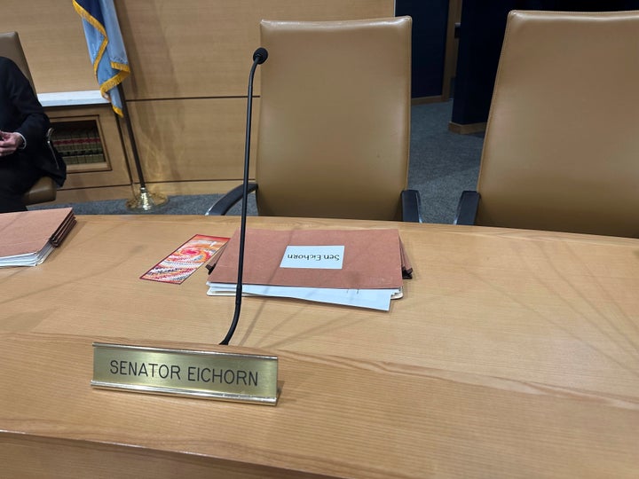 The chair for Minnesota state Sen. Justin Eichorn, a Republican from Grand Rapids, sits empty in a Senate hearing room in the State Capitol complex in St. Paul on Tuesday, March 18, 2025, a day after his arrest in Bloomington for allegedly soliciting a minor for prostitution. (AP Photo/Steve Karnowski)
