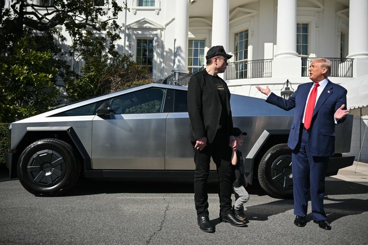 President Donald Trump and Tesla CEO Elon Musk speak to the press as they stand next to a Tesla Cybertruck on the South Portico of the White House on March 11.