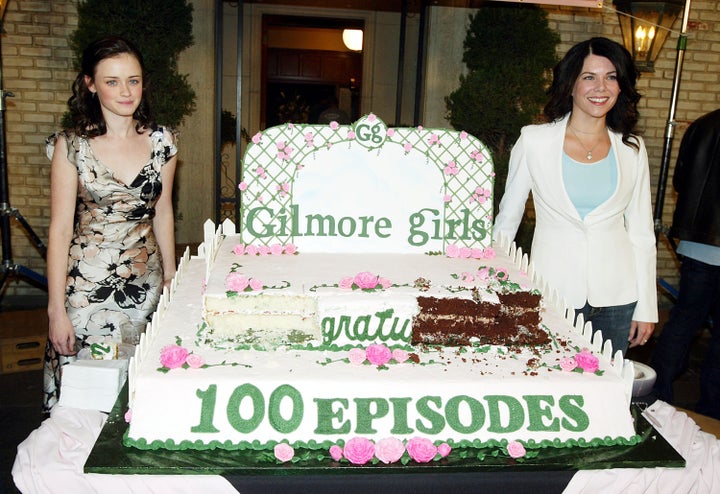 Bledel and Graham pose at The WB Networks "The Gilmore Girls" 100th episode celebration on the set at Warner Bros. Studios on Jan. 31, 2005.