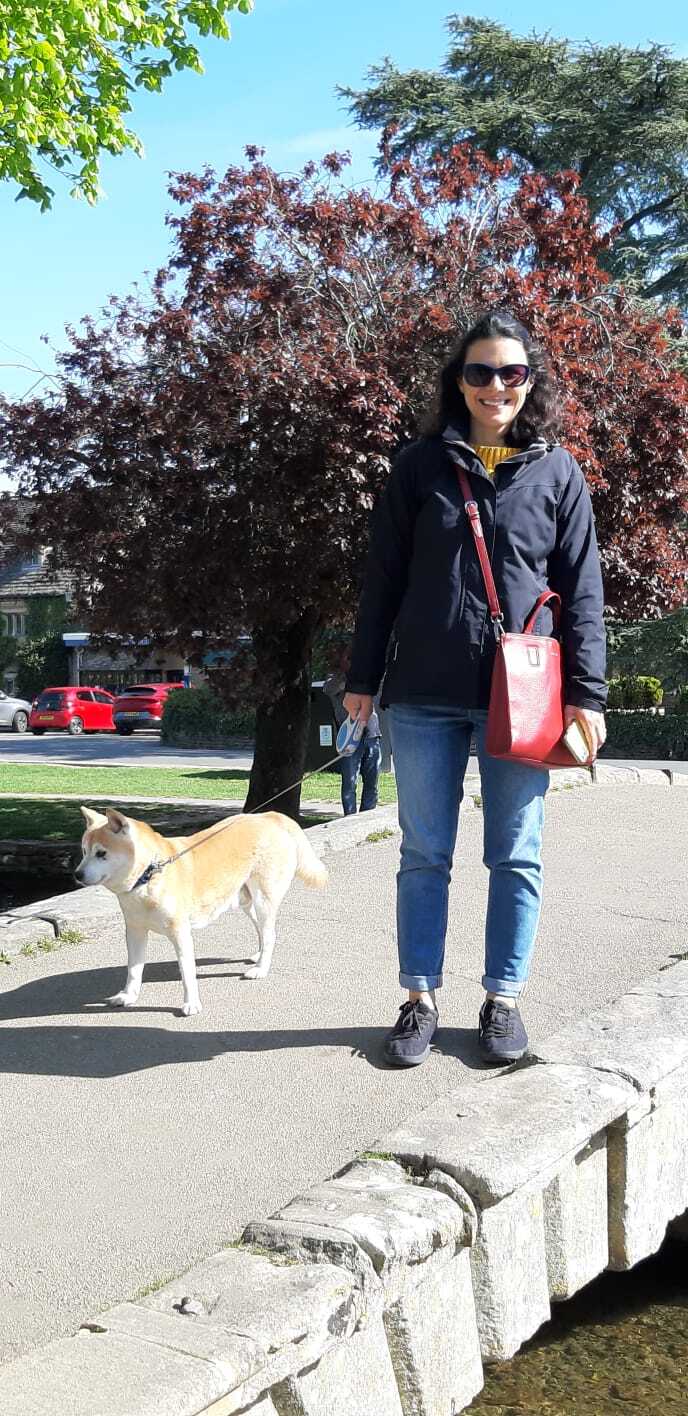 Monica with Dojo in Bourton-on-the-Water, April 2022.