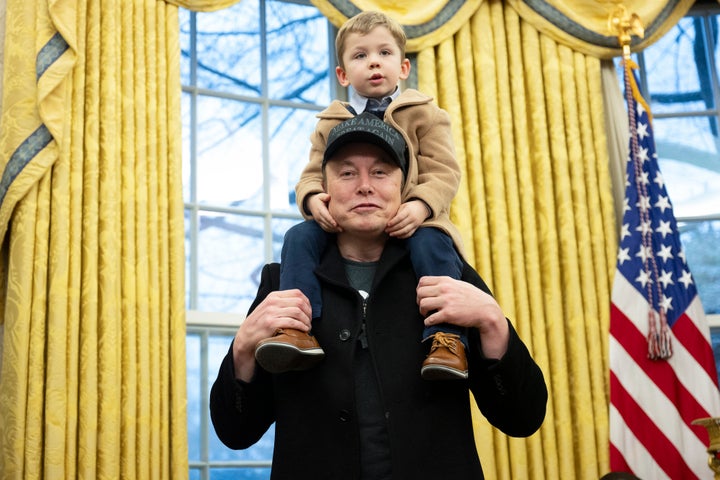 Elon Musk carries his son X Æ A-Xii on his shoulders in the Oval Office of the White House last month in Washington.