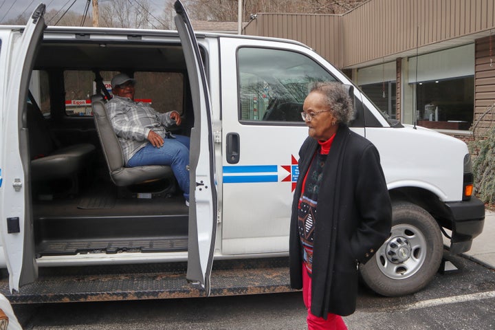 Mary Weaver, right, and Veronia Taylor get into a van as they leave the McDowell County Commission on Aging Senior Center in Welch, W.Va., Thursday, March 20, 2025. (AP Photo/Leah Willingham)