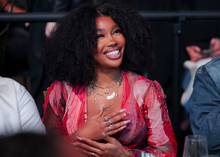 SZA's dad collected first-edition comics, leading to her appreciation for superheroes.