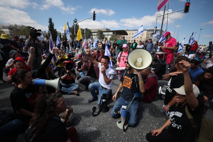 Israelis protesters gather outside Prime Minister Benjamin Netanyahu's office in West Jerusalem, during a meeting on the vote of confidence in the government against Attorney General Gali Baharav-Miara, on March 23, 2025.