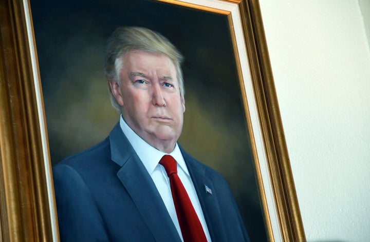 President Donald Trump's portrait hangs in the Colorado Capitol after an unveiling ceremony Thursday, Aug. 1, 2019, in Denver. Colorado Republicans raised more than $10,000 through a GoFundMe account to commission the portrait, which was painted by Sarah Boardman, an artist who also produced the Capitol's portrait of President Barack Obama. (AP Photo/Thomas Peipert)