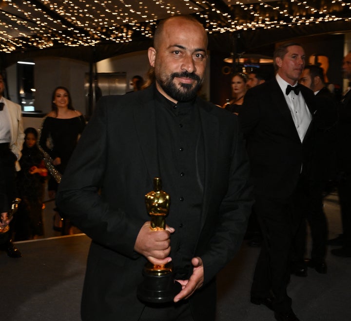 Palestinian filmmaker Hamdan Ballal holds his Oscar for Best Documentary Feature for "No Other Land" during the 97th Annual Academy Awards Governors Ball at the Dolby Theatre in Hollywood, California on March 2, 2025. (Photo by ANGELA WEISS / AFP) (Photo by ANGELA WEISS/AFP via Getty Images)