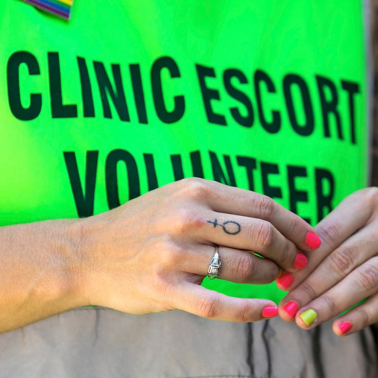 An abortion clinic escort outside of Hope Medical Group for Women in Shreveport, Louisiana on July 6, 2022.