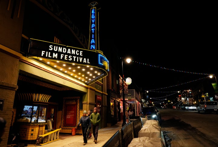 Pedestrians walk underneath the marquee of the Egyptian Theatre before the start of the Sundance Film Festival on Wednesday, Jan. 22, 2025, in Park City, Utah. The festival will move to Boulder, Colorado, in 2027.