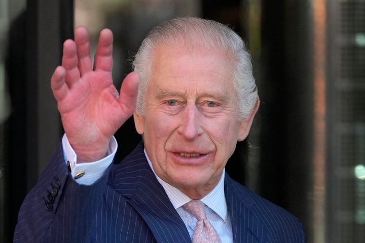 Britain's King Charles III waves as he arrives for a visit to University College Hospital Macmillan Cancer Centre in London, Tuesday, April 30, 2024.