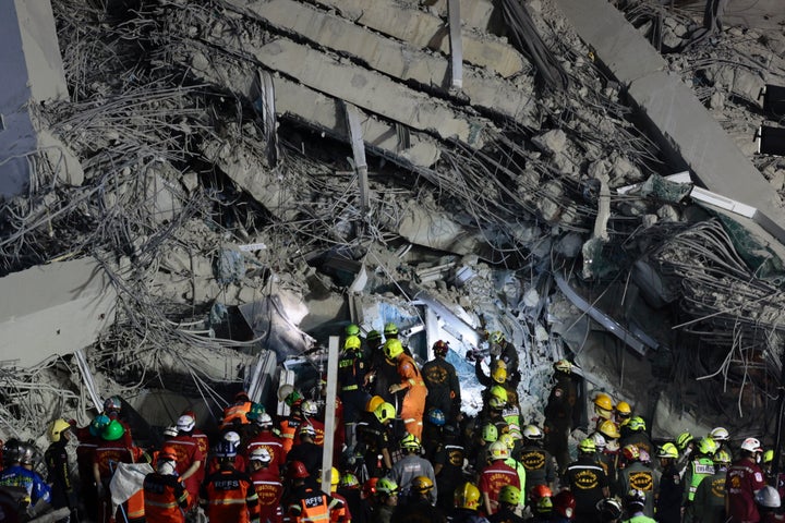 Rescuers work at the site of a high-rise building under construction that collapsed after a 7.7 magnitude earthquake in Bangkok, Thailand, early Saturday, March 29, 2025. (AP Photo/Wason Wanichakorn)