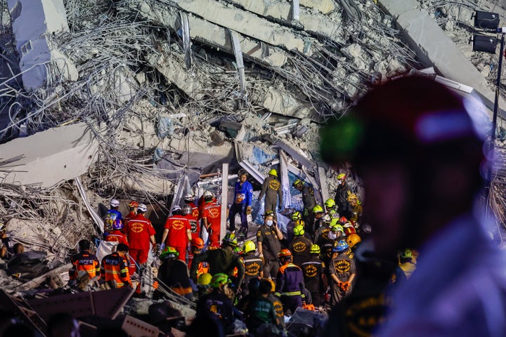 Myanmar Earthquake Demise Toll Jumps To 1,644 As Extra Our bodies Recovered From Rubble 2 Rescuers try to enter the rubble to search for survivors, as dozens of people are believed to have been trapped in the rubble of a collapsed high-rise building that was still under construction, after a magnitude 7.7 earthquake struck neighbouring country Myanmar, in Bangkok, Thailand, on March 29, 2025. (Photo by Daniel Ceng/Anadolu via Getty Images)