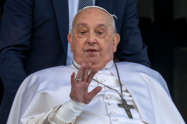 Pope Francis appears at a window of the Agostino Gemelli Polyclinic in Rome, Sunday, March 23, 2025, where he has been treated for bronchitis and bilateral pneumonia since Feb. 14. (AP Photo/Domenico Stinellis)
