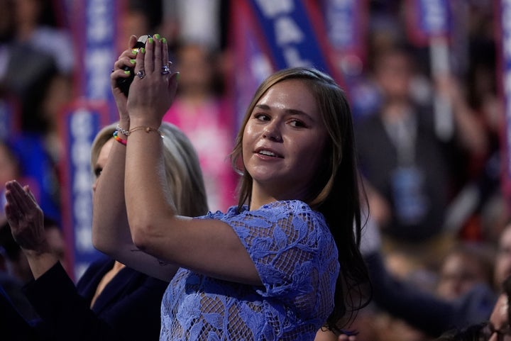 Hope Walz, daughter of Minnesota Gov. Tim Walz, cheers during the Democratic National Convention on Aug. 21, 2024, in Chicago.