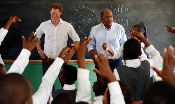 Prince Harry and Prince Seeiso of Lesetho meets pupils during their visit to the Kananelo Centre for the Deaf outside Maseru, Lesotho on Feb. 27, 2013.