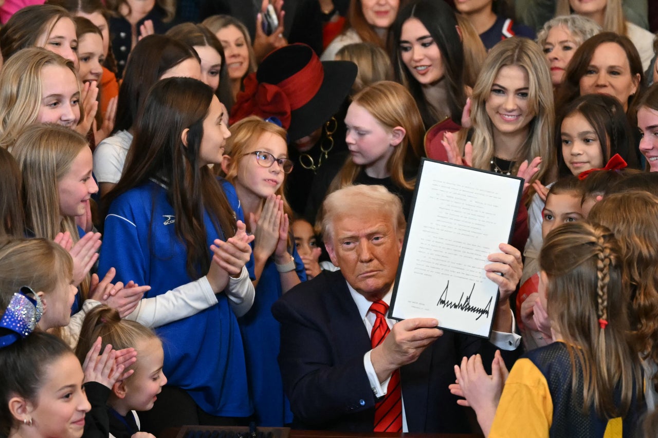 The Trump Administration Has Launched A Warfare On Children 3 President Donald Trump signs the "No Men in Women's Sports" executive order, which bans transgender girls and women from competing on sports teams that match their gender identity, while surrounded by girls and young women.