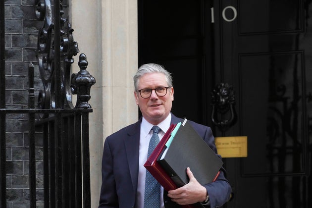 Keir Starmer leaves 10 Downing Street to attend PMQs.