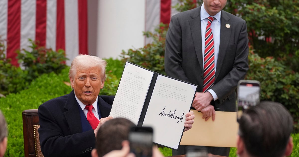 NextImg:Asian Markets Tumble After Trump's Tariffs Bombshell