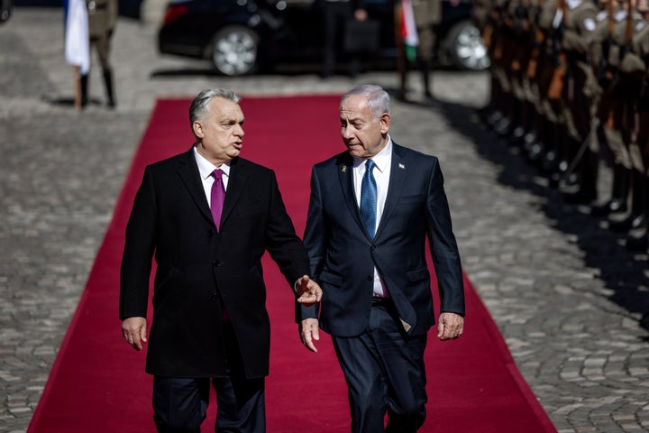 Hungarian Prime Minister Viktor Orbán (L) receives Israeli Prime Minister Benjamin Netanyahu on April 3, 2025, in Budapest, Hungary. Netanyahu's scheduled four-day visit to Hungary marks his second foreign trip since the International Criminal Court (ICC) issued a warrant for his arrest in November, accusing him of perpetrating war crimes in Gaza. Hungary announced during Netanyahu's visit that the country would begin the process of withdrawing from the ICC, despite being a founding member of the global tribunal.