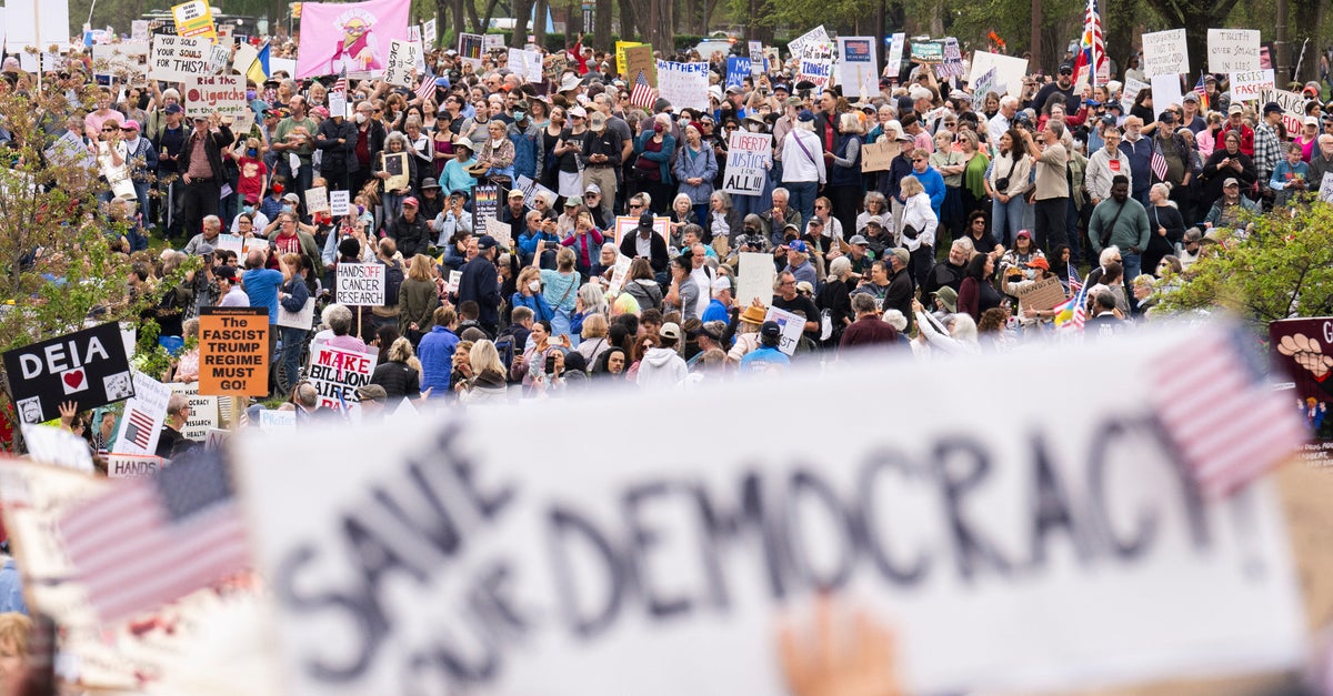 Protesters Tee Off Against Trump In "Hands Off!" Rallies Across The U.S.
