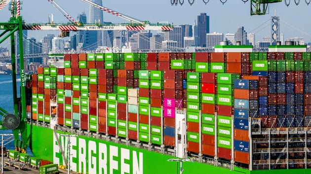 Shipping containers line the Ever Most cargo vessel docked at the Port of Oakland on Thursday, April 3, 2025, in Oakland, Calif. (AP Photo/Noah Berger)