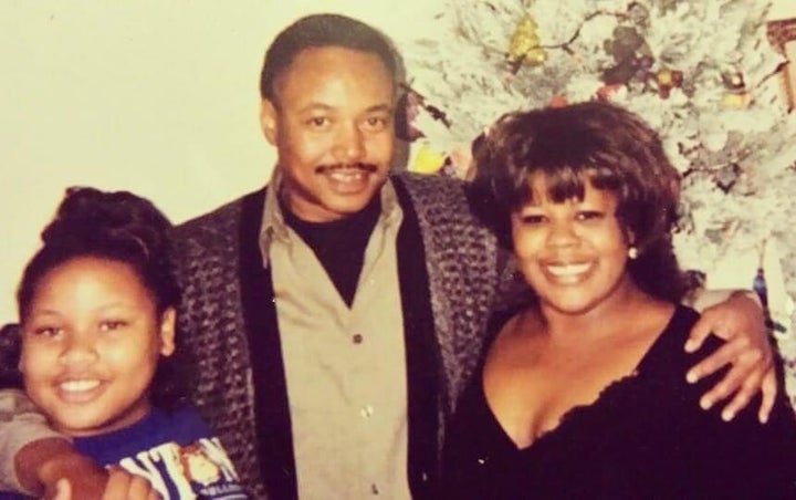 A childhood photo of the author with her parents, taken when she was 11. The strength she saw in her mother shaped how she viewed herself.