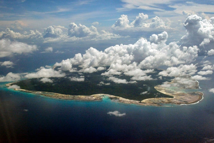 Clouds hang over the North Sentinel Island, in India's southeastern Andaman and Nicobar Islands, on Nov. 14, 2005. (AP Photo/Gautam Singh, File)