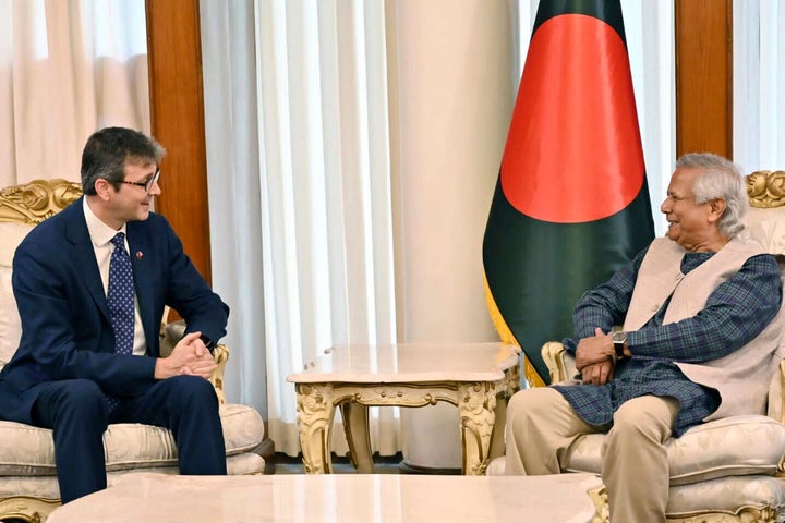 Brent Neiman, then-U.S. assistant secretary of the treasury for international finance and development, is seen with Bangladesh's interim government's leader, Muhammad Yunus, in September.
