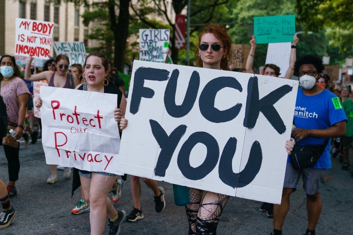 Protesters march to the Capitol building to protest the Supreme Court's decision in the Dobbs v. Jackson Women's Health case on June 24, 2022, in Atlanta, Georgia. The court's decision overturns the 50-year-old landmark Roe v. Wade case, removing a federal right to an abortion.