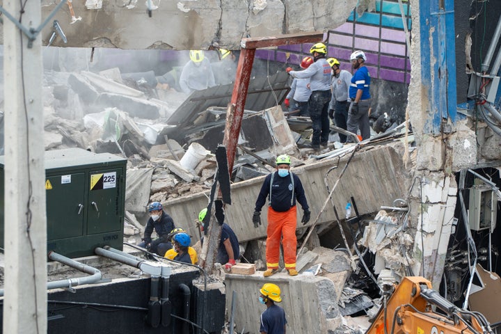 Rescue teams work at the Jet Set nightclub a day after the collapse of its roof in Santo Domingo on April 9, 2025. (Photo by FRANCESCO SPOTORNO/AFP via Getty Images)