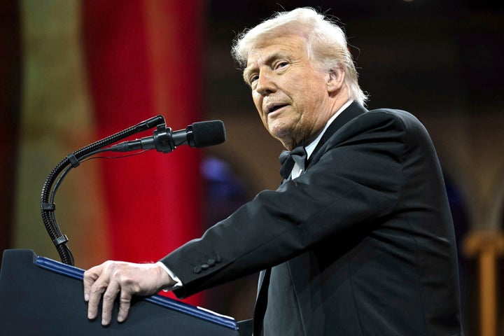 President Donald Trump speaks at the National Republican Congressional Committee (NRCC) dinner at the National Building Museum in Washington, Tuesday, April 8, 2025. (Pool via AP)
