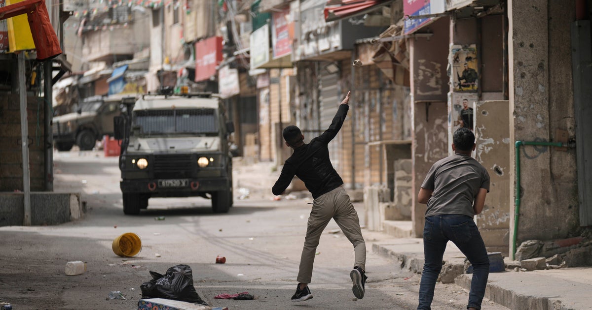 NextImg:Israeli Strike On Gaza Apartment Building Kills At Least 23, Officials Say