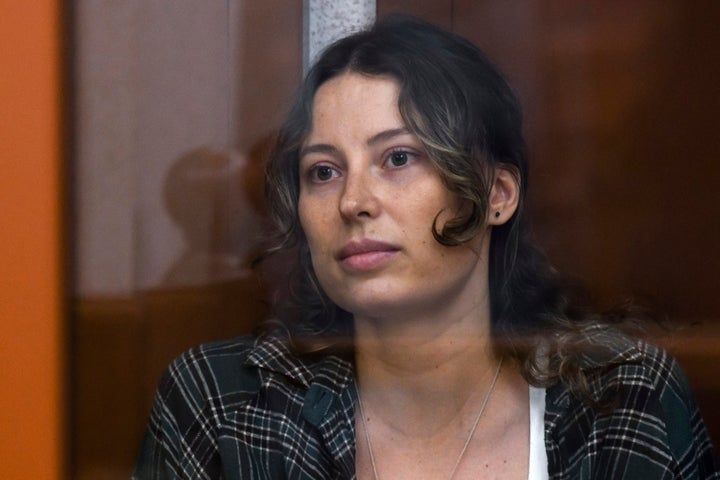 Ksenia Karelina, also known as Khavana sits in a glass cage in a court room in Yekaterinburg, Russia, on June 20, 2024.