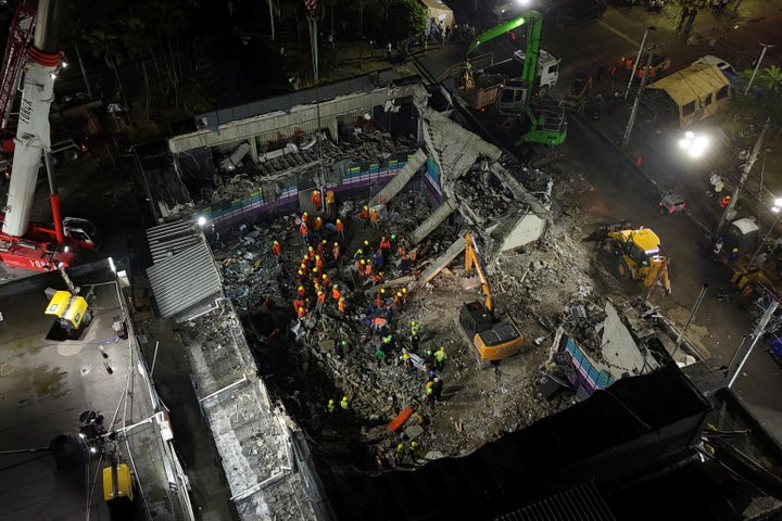 Rescue workers search for bodies at the Jet Set nightclub after its roof collapsed during a merengue concert in Santo Domingo, Dominican Republic, Thursday, April 10, 2025. (AP Photo/Matias Delacroix)