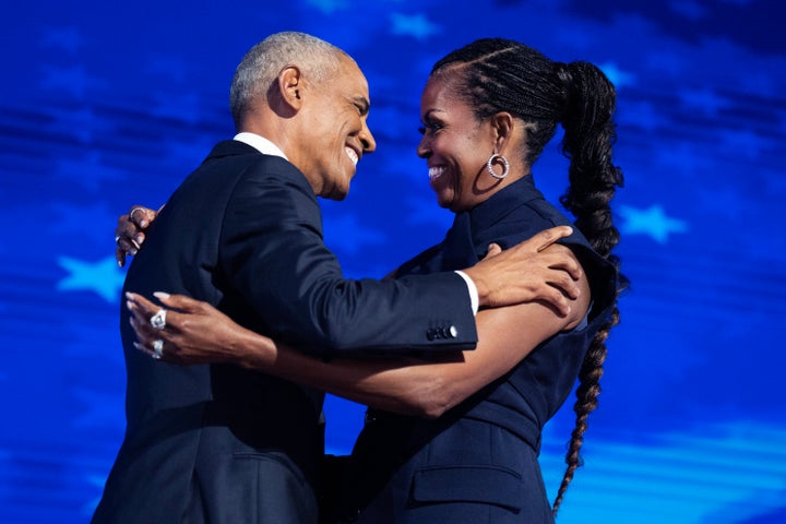 Former President Barack Obama and former first lady Michelle Obama photographed together at the Democratic National Convention in Chicago on Aug. 20, 2024.