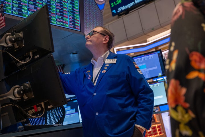 NEW YORK, NEW YORK - APRIL 11: Traders work on the floor of the New York Stock Exchange (NYSE) on April 11, 2025 in New York City. After one of the most volatile weeks in recent market history, the major indexes ended the week up 5%, with the Dow closing at over 600 points. (Photo by Spencer Platt/Getty Images)