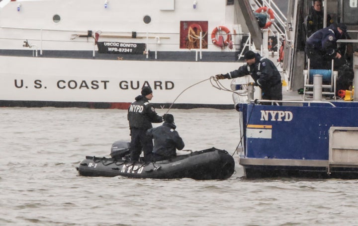 JERSEY CITY, NEW JERSEY - APRIL 11: NYPD SCUBA divers work on the scene where a helicopter crashed on the Hudson River on April 11, 2025 in Jersey City, New Jersey. Six people were killed when a sightseeing helicopter broke apart and crashed into the Hudson River between New York City and New Jersey. Those killed included a family of five from Spain. The children were 4, 8 and 10 years old and the 8-year-old's birthday was Friday, Mayor Eric Adams said. (Photo by Kena Betancur/VIEWpress)