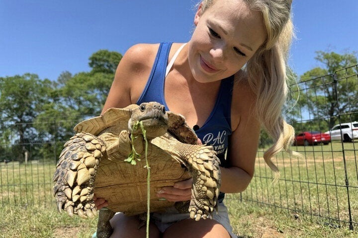 Tiffany Emanuel holds her pet tortoise, Myrtle.