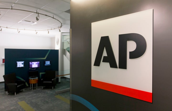 FILE - A logo for The Associated Press is seen at its headquarters in New York on Tuesday, April 26, 2016. (AP Photo/Hiro Komae, File)