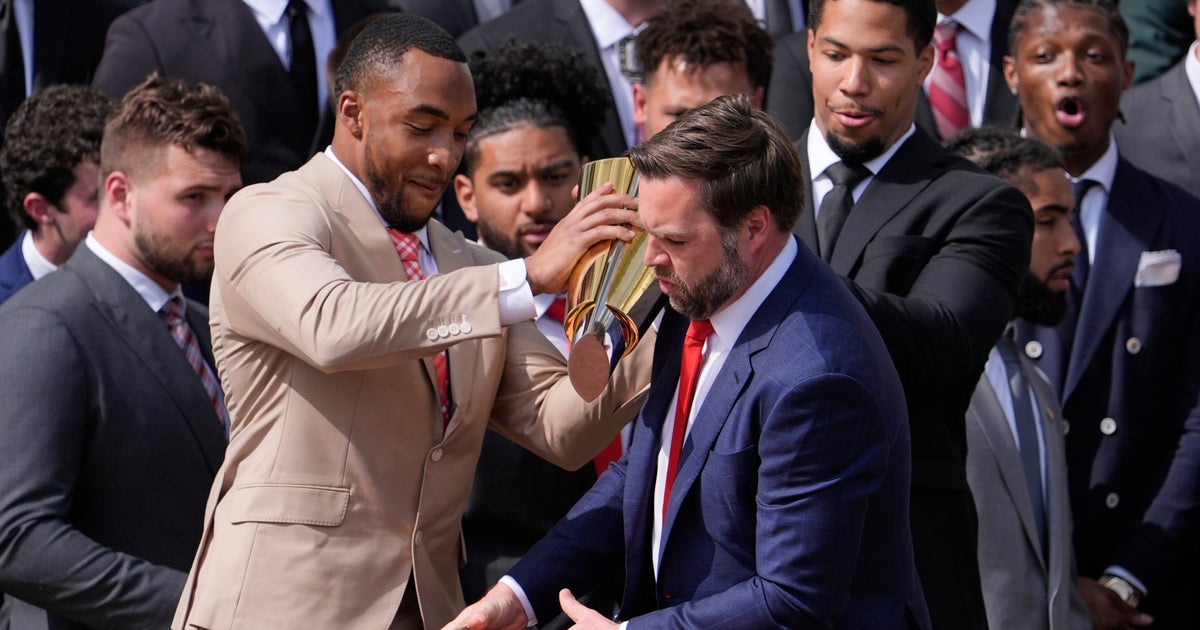 NextImg:Social Media Reacts To JD Vance Fumbling Ohio State Football Trophy