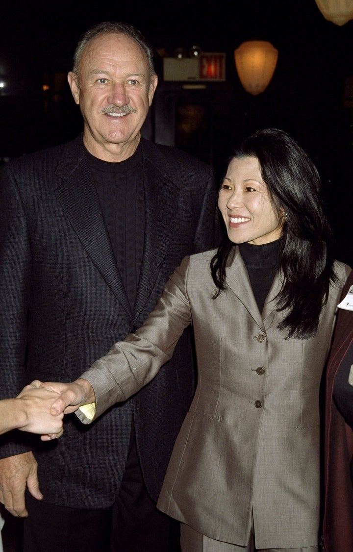Gene Hackman and wife Betsy Arakawa in November 1999. On Tuesday, investigators released body camera footage that shows police surveying the home where the couple was found dead in February.